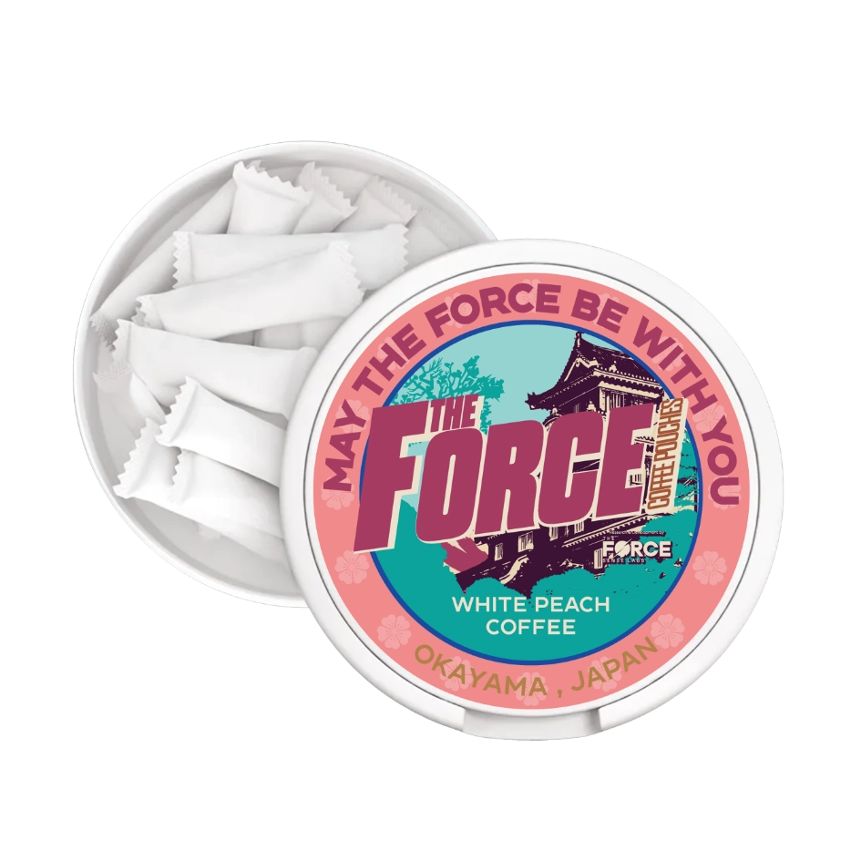  A hand holding a single WHITE PEACH COFFEE Flavor 50mg caffeine COFFEE POUCH by THE FORCE SENSE LABS